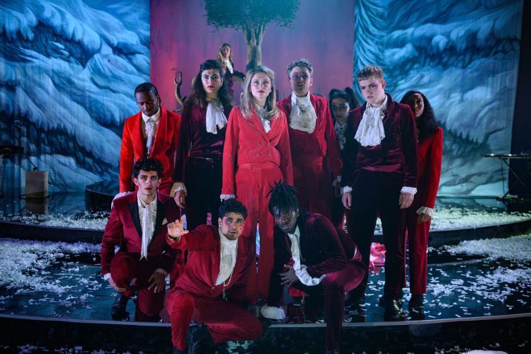 Scene from Orlando - actors standing in group